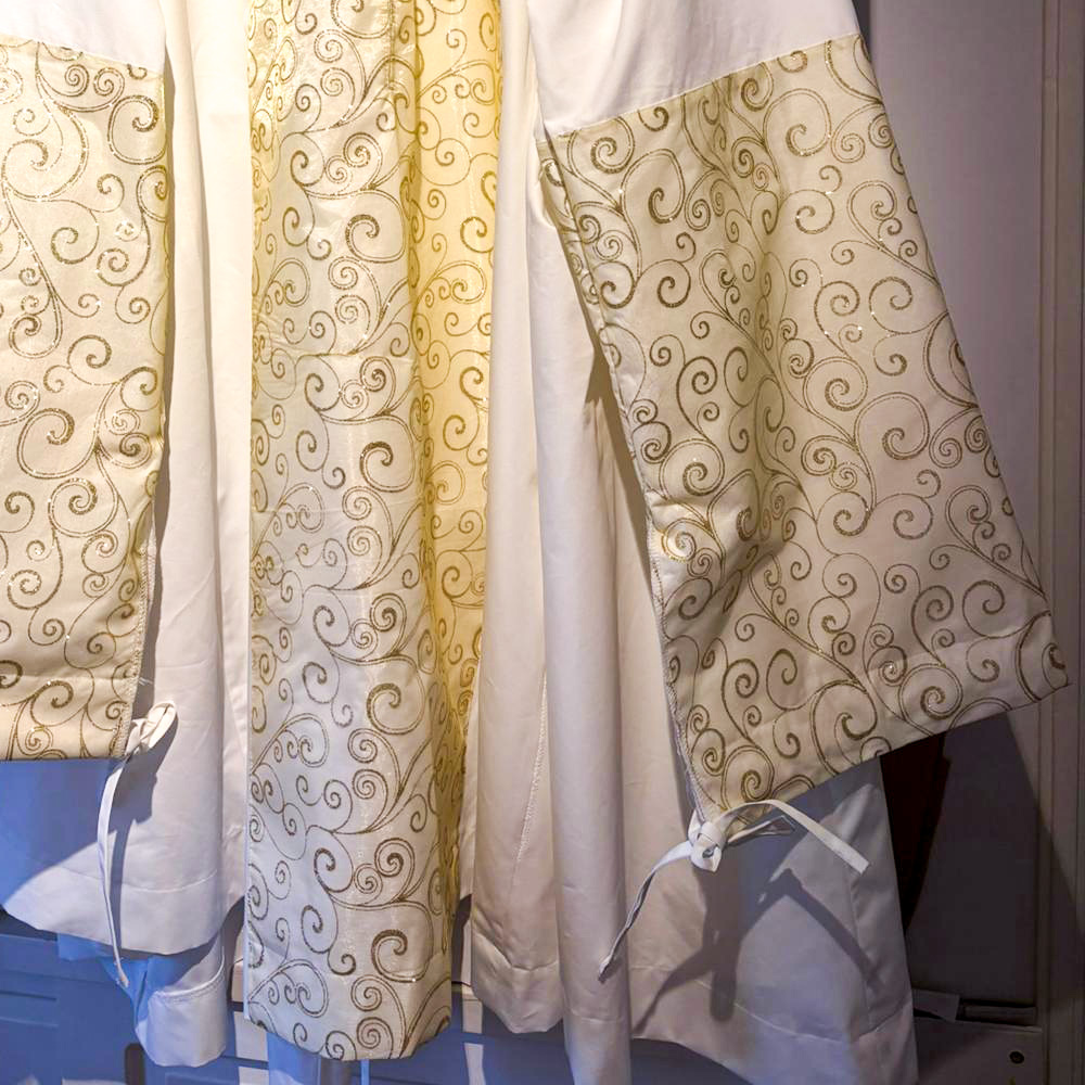 Detail van de jurk van Maria